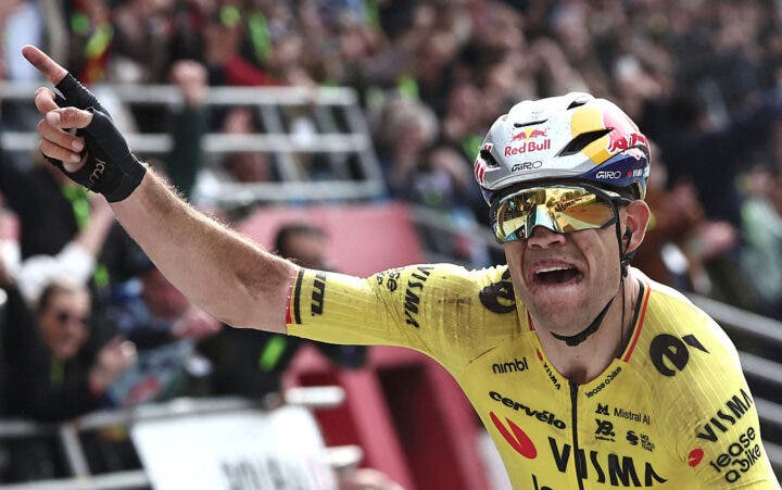 Team Visma - Lease a Bike's Belgian rider Wout van Aert celebrates as he crosses the finish line to win the 123rd edition of the Paris-Roubaix one-day classic cycling race, 258.3 km between Compiègne and Roubaix, at the Vélodrome André-Pétrieux in Roubaix, northern France, on April 12, 2026. (Photo by )