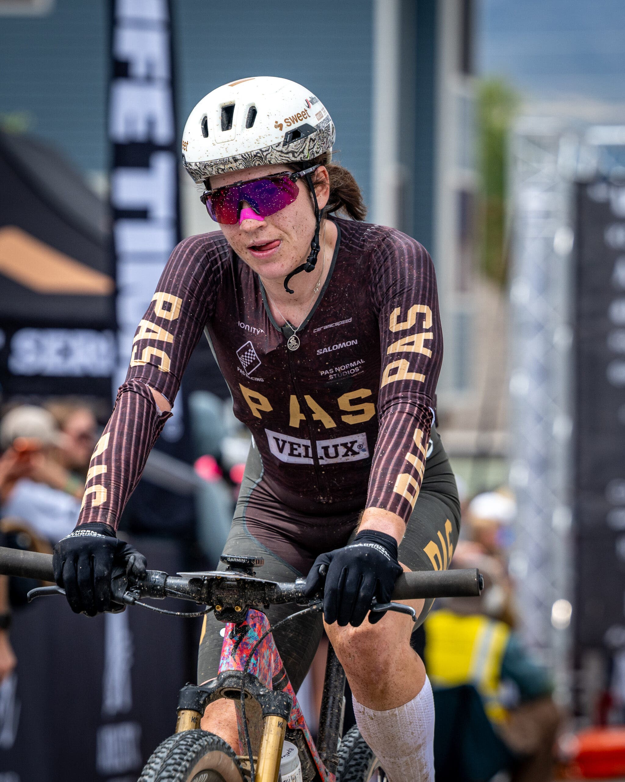 A dejected Decker riding across the line for second at Leadville.