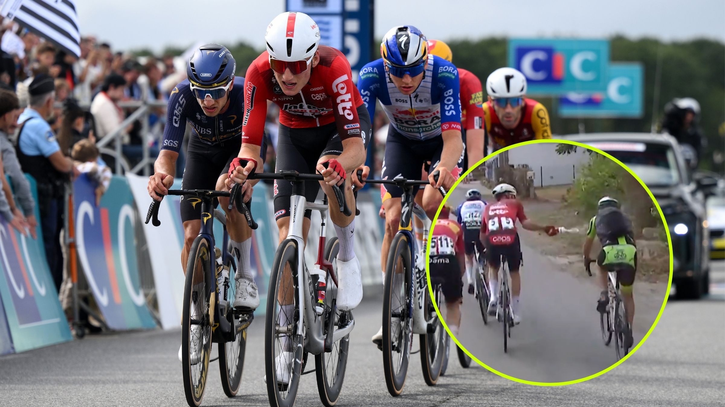  Fan Riding on Course at Bretagne Classic Sprayed by Riders