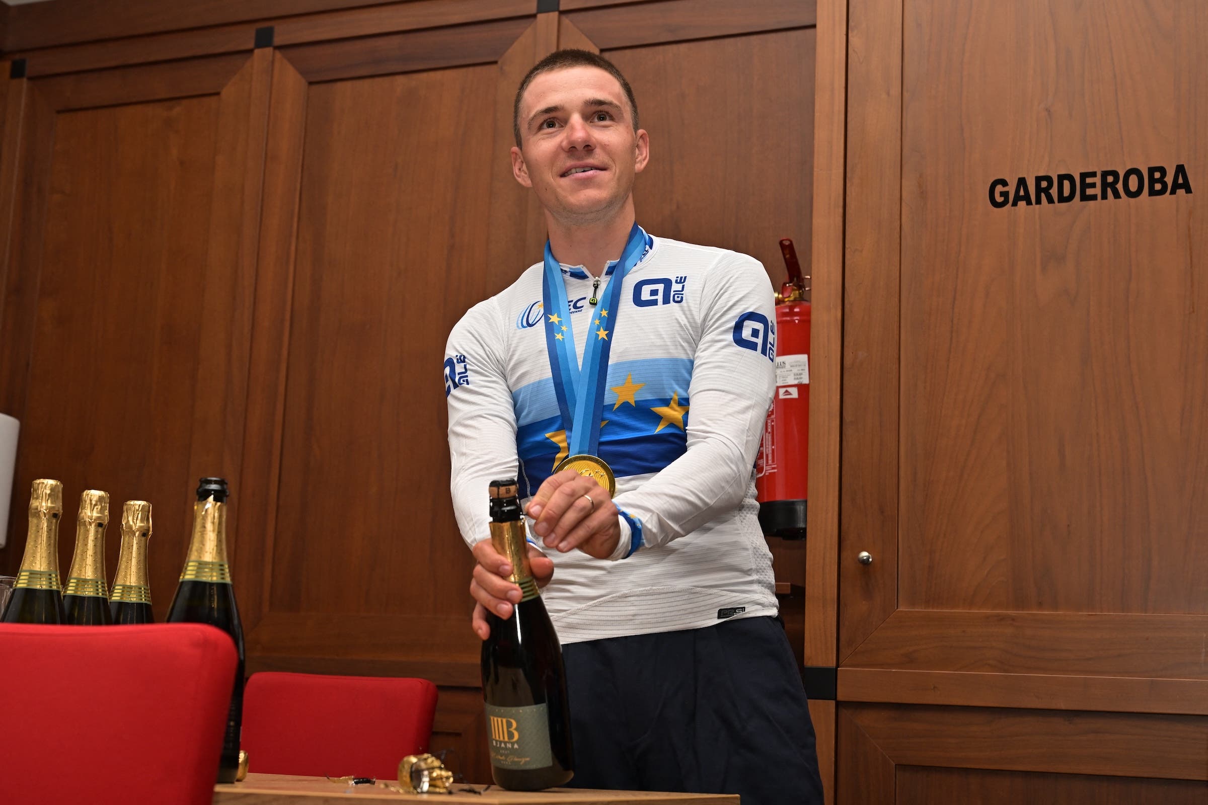 Remco Evenepoel pictured during celebrations after winning the European road race championship (Photo: David Pintents / Belga Mag via AFP)